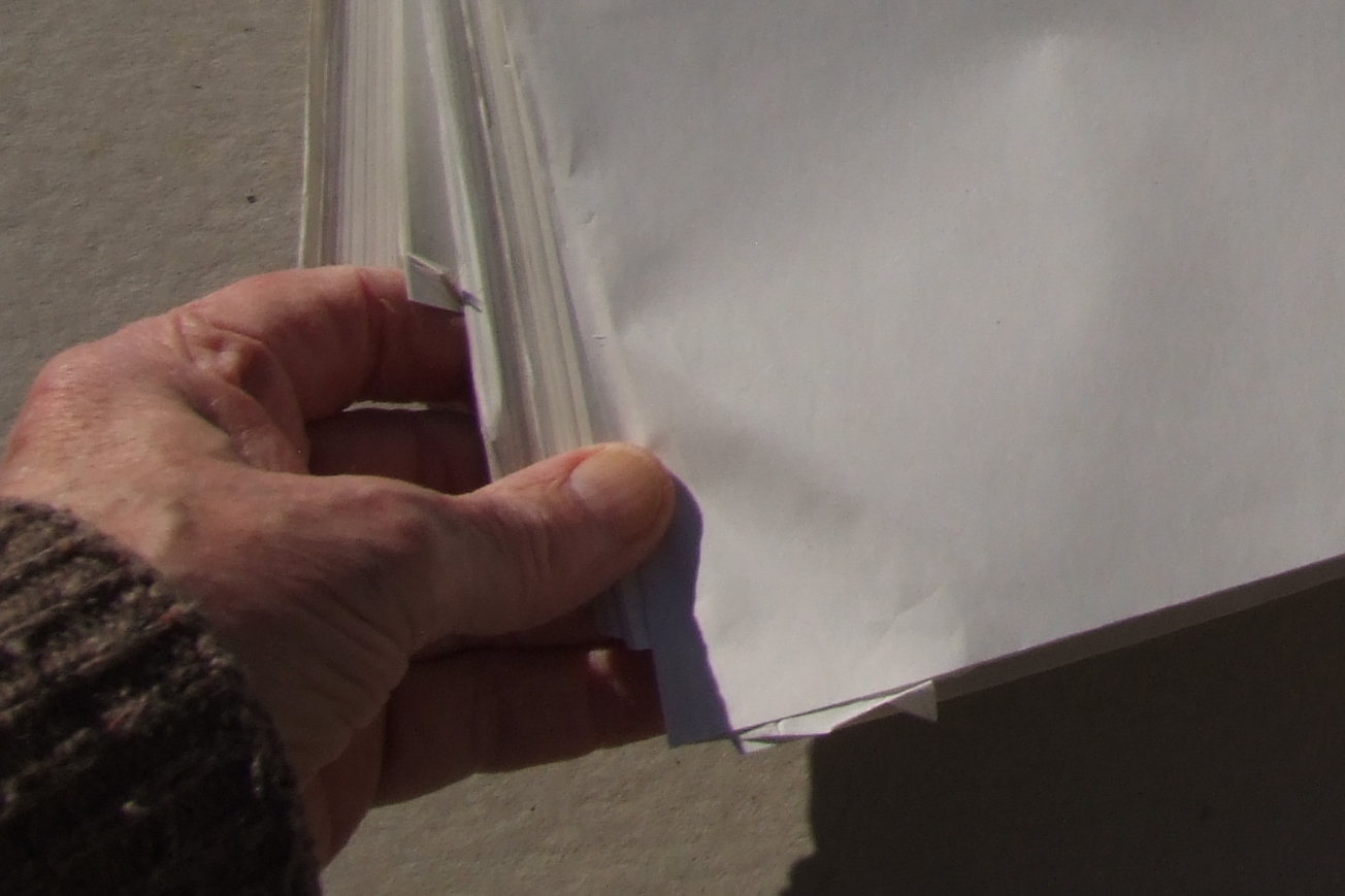 Damaged corners of a newsprint bundle