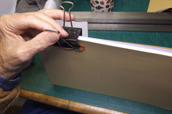 Clipping pages after tapping them down