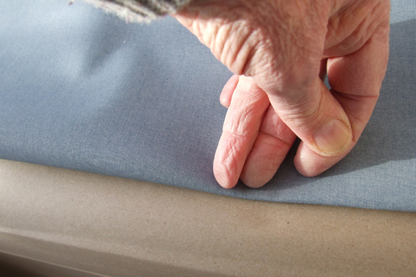 Folding and pressing bookcloth before cutting
