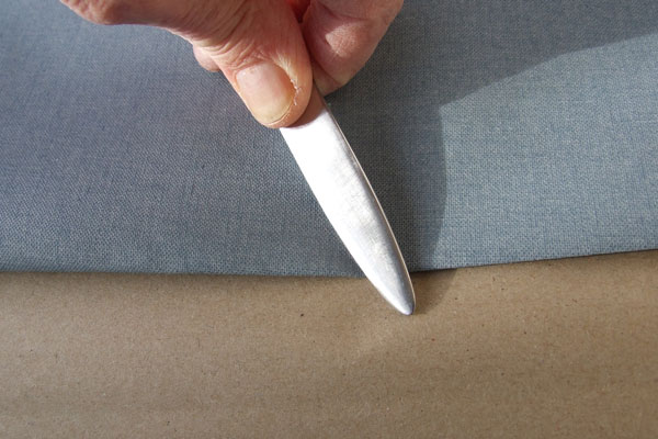 Creasing bookcloth wih a folder