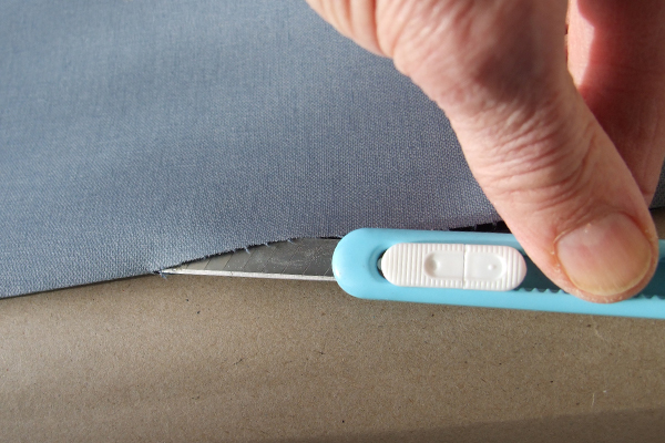 Cutting bookcloth carefully