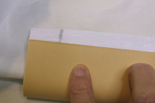 Signature marks at the left hand end