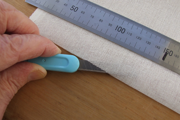 Cutting bookcloth with a sharp knife