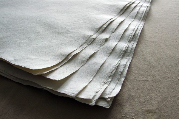 Wavy wrinkles at the edge of handmade paper