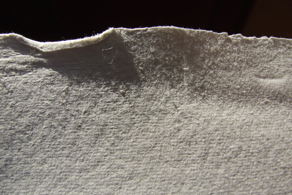 A sllight bend in the deckle edge